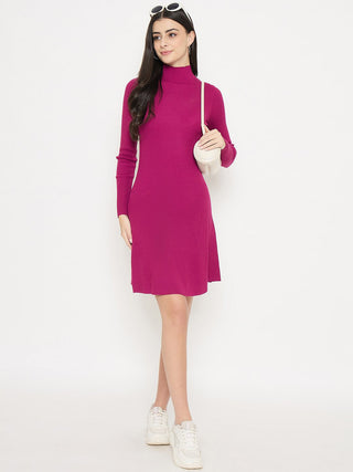 Woman wearing a magenta dress with white sneakers on a white background