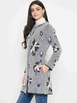 Madame Floral Print Button-Front Black Cardigan worn by a model, showcasing its elegant floral design and lightweight comfort.