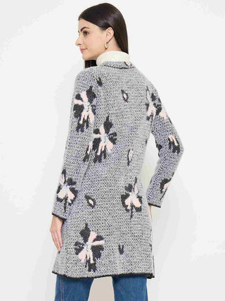 Madame Floral Print Button-Front Black Cardigan displaying a stylish design from the back with floral accents.